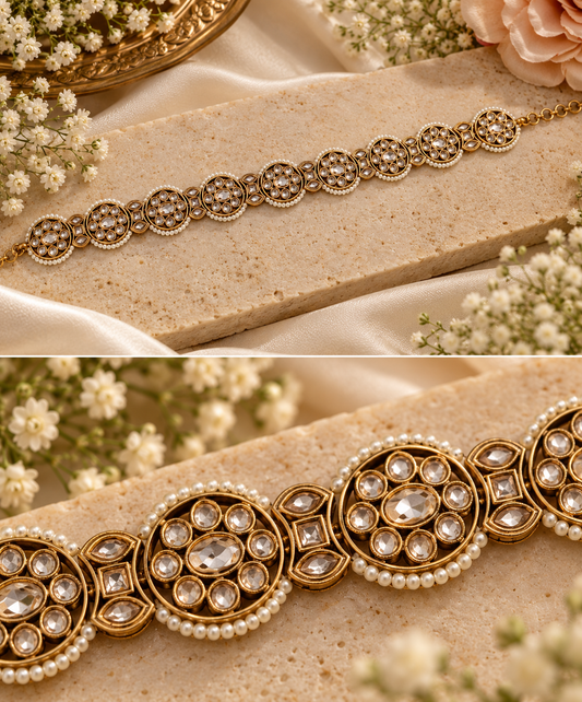 Close-up of Nitisha Polki Sheeshphool showing detailed circular motifs, stone settings and pearl edging.