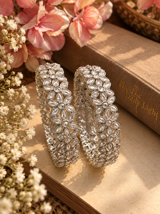 Sunisha silver polki kadas with intricate stone detailing